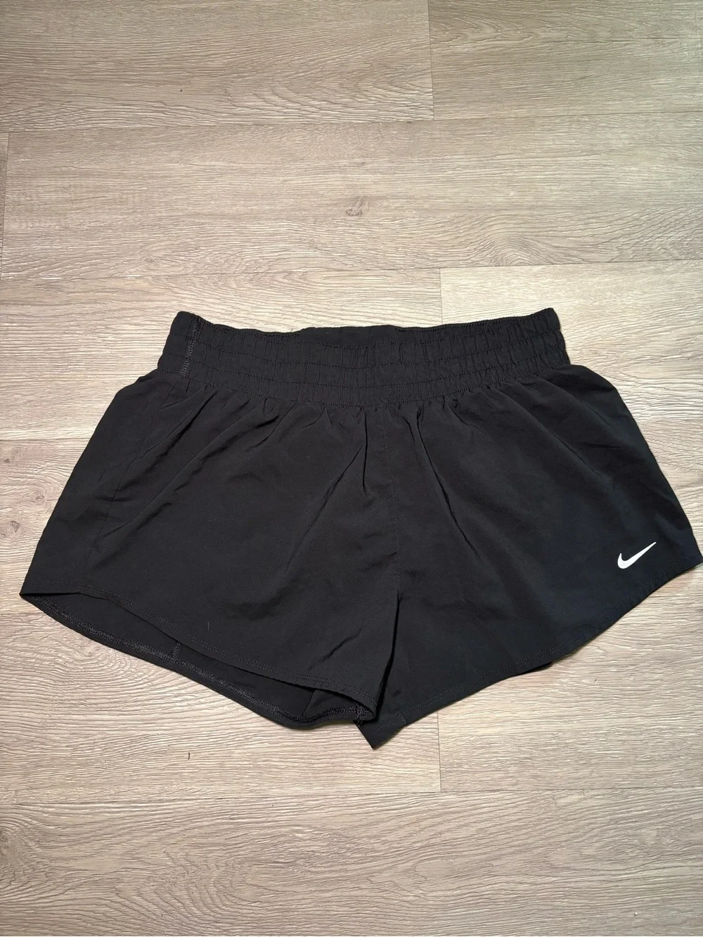 Nike Black Women's Athletic Shorts with White Swoosh